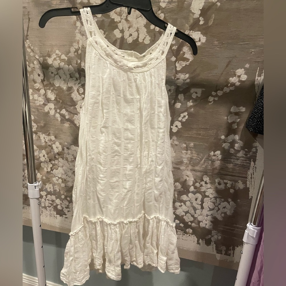Summer white dress with lining.  Feels mostly cotton